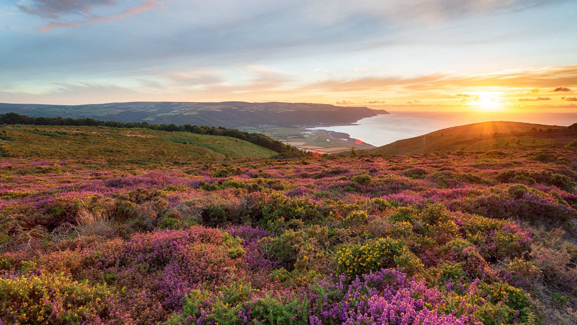sunset over the sea and countryside in Exmoor