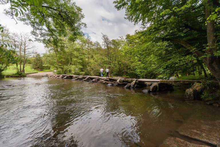 Tarr Steps stone bridge over the river in Exmoor National Park